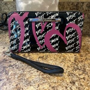 Betsey Johnson Black and Pink Wristlet with Heart Design